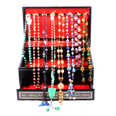 Lot 502 - Eight vintage bead necklaces and sautoirs.