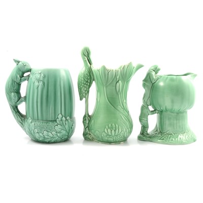 Lot 102 - Three green Sylvac jugs.