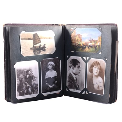 Lot 109 - Three albums of postcards and 1920s filmstar studio portrait cards