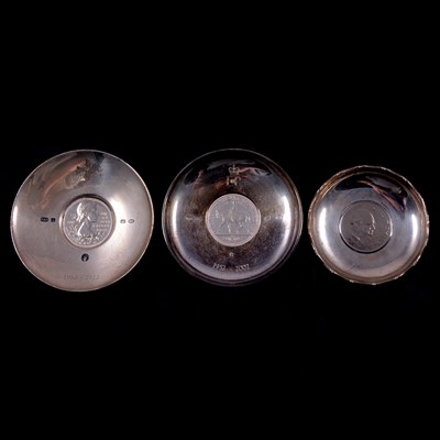 Lot 259 - Three silver and coin set dishes