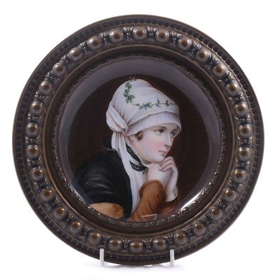 Lot 32 - Continental porcelain portrait dish, in a copper frame