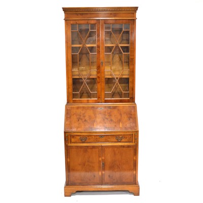 Lot 259 - Reproduction yew wood effect bureau bookcase