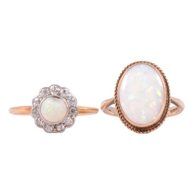 Lot 8 - Two opal dress rings.