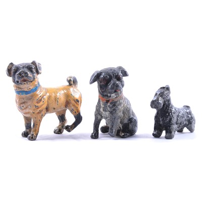 Lot 132 - Cold-painted figue of a pug, and two other cast metal dogs