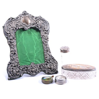 Lot 182 - A silver photograph frame, silver top jar etc.