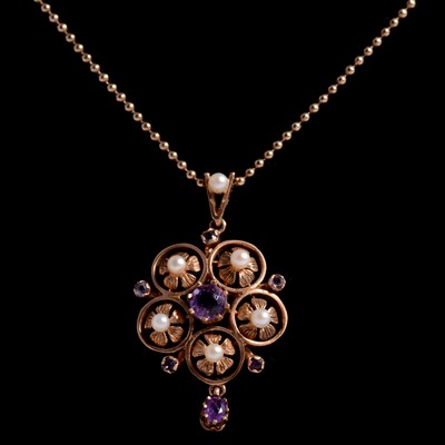 Lot 273 - An amethyst and seed pearl pendant and chain.