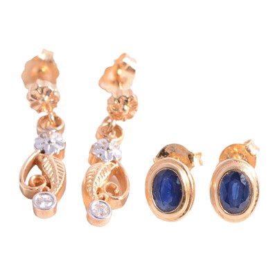 Lot 219 - A pair of diamond set floral drop earrings and a pair of sapphire earrings.