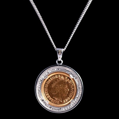 Lot 129 - A Gold Half Sovereign Coin pendant and chain.