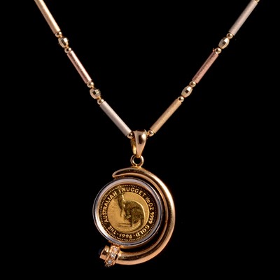 Lot 131 - The Perth Mint - The Australian Nugget 1/10oz 9999 Gold / 15 Dollars Gold Coin pendant.