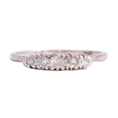 Lot 82 - A diamond five stone ring.