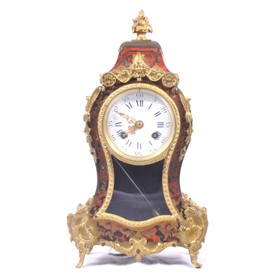 Lot 137 - A Giese & Dollmann simulated tortoiseshell boulle style clock with brass mounts.