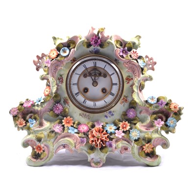 Lot 141 - Continental porcelain cased ornamental mantel clock.