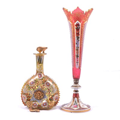 Lot 136 - Bohemian overlaid ruby glass flute and enamelled amber glass flask.