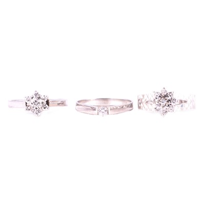 Lot 86 - Three 9 carat white gold diamond rings.