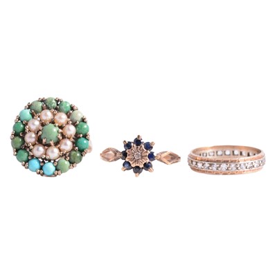 Lot 42 - A vintage turquoise ring, sapphire reverse cluster, eternity ring, two pairs of emerald studs.