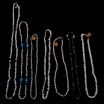 Lot 323 - Fourteen cultured freshwater pearl necklaces.