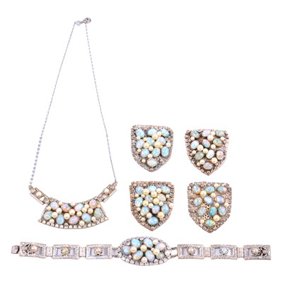 Lot 461 - A 1930's parure of necklace, bracelet and clips set with simulated pearls and opals.