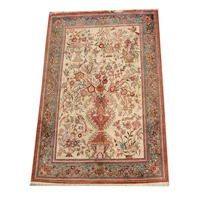 Lot 637 - A silk rug, floral design.