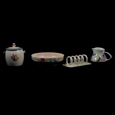 Lot 41 - Poole Pottery - biscuit barrel, shallow bowl, milk jug and toast rack