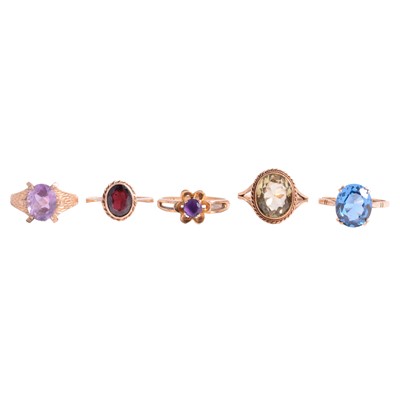 Lot 32 - Five gemset dress rings, amethyst, garnet, synthetic blue spinel.