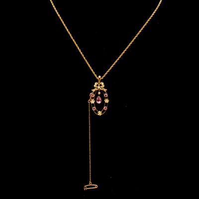 Lot 272 - An Edwardian pink tourmaline and pearl pendant on a chain.